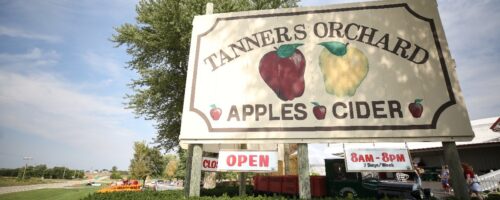 The front sign at the entrance of Tanners Orchard