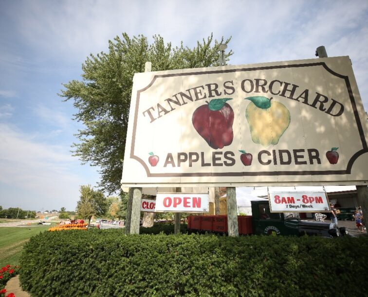 The front sign at the entrance of Tanners Orchard